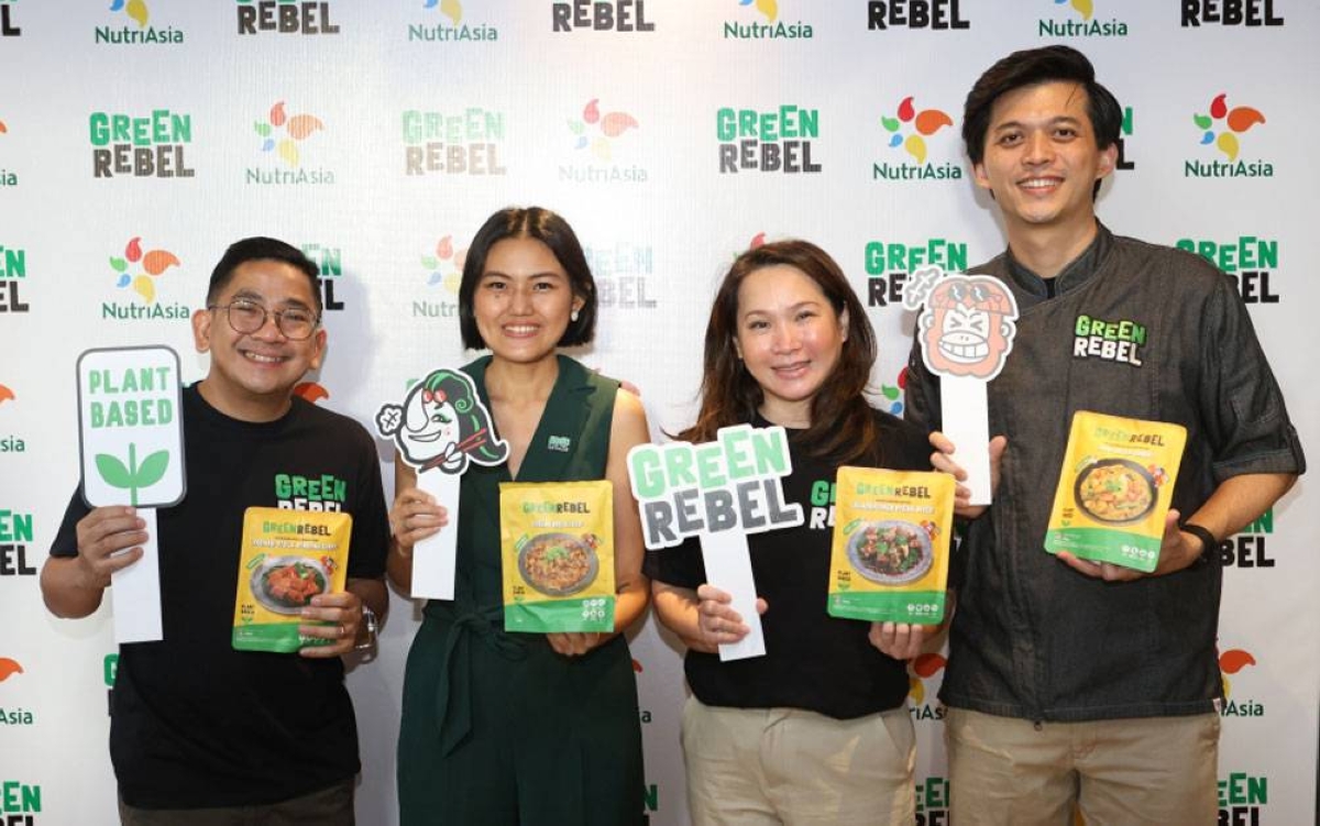 A ‘li-meat-less’ partneship between NutriAsia and Green Rebel is represented by (from left) Mario Mendoza Jr., NutriAsia New Business Development head; Helga Angelina Tjahjadi, Green Rebel co-founder and chief executive officer; Angie Flaminiano, NutriAsia president and chief operating officer; and Max Mandias, Green Rebel co-founder and Research & Development director. CONTRIBUTED PHOTO