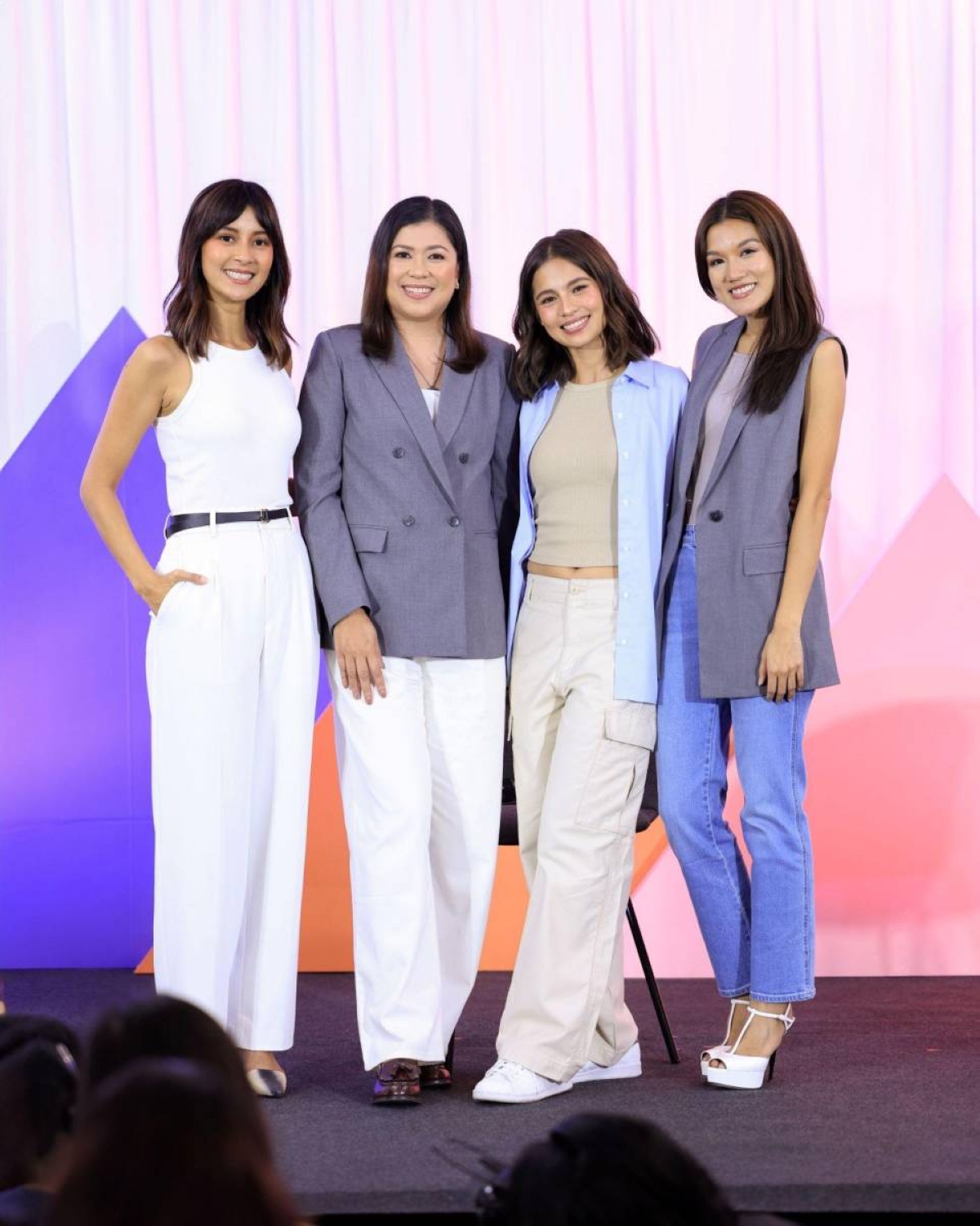 She Talks Asia Co-founder Bianca Gonzales-Intal, Uniqlo Philippines VP for Marketing Georgette Barrera-Jalasco, Uniqlo Bratop user and advocate Jasmine Curtis-Smith, and She Talks Asia Co-founder Lynn Pinugu share the stage during the She Talks Asia Summit 2024
