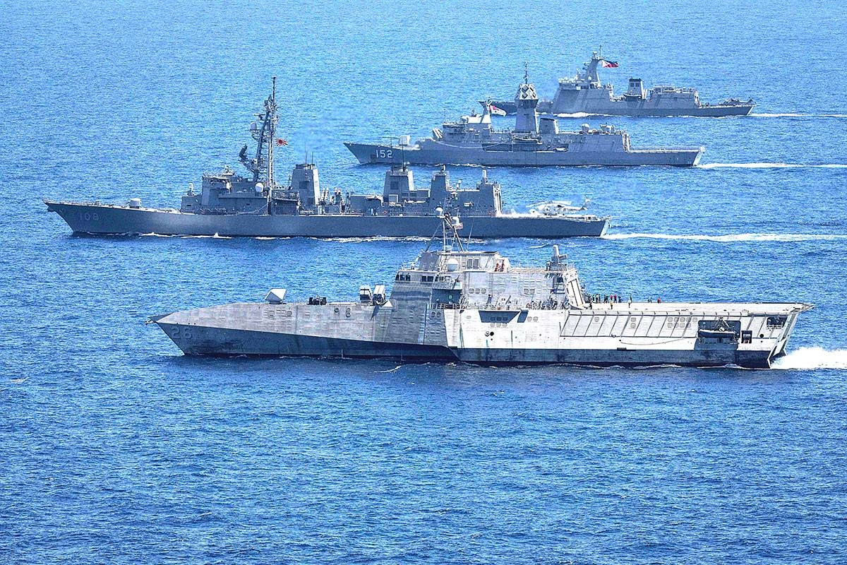 ALL IN A ROW A handout photo taken on Sunday, April 7, 2024, received from the Australian Department of Defense on April 8, shows the USS Mobile, JS Akebono, HMAS Warramunga and BRP Antonio Luna sailing in formation during a multilateral maritime cooperative activity between Australia, the United States, Japan and the Philippines. AFP PHOTO