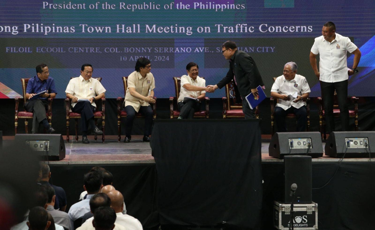 President Ferdinand Marcos Jr. talks at the Bagong Pilipinas Town Hall Meeting in San Juan City on Wednesday, April 10, 2024. With him were Socioeconomic Planning Secretary Arsenio Balisacan, Public Works Secretary Manuel Bonoan, Local Government Secretary Benjamin Abalos, Jr., Metropolitan Manila Development Authority Chairman Romando Artes, Transportation Secretary Jaime Bautista and San Juan City Mayor Francis Zamora. PHOTOS BY RENE H. DILAN