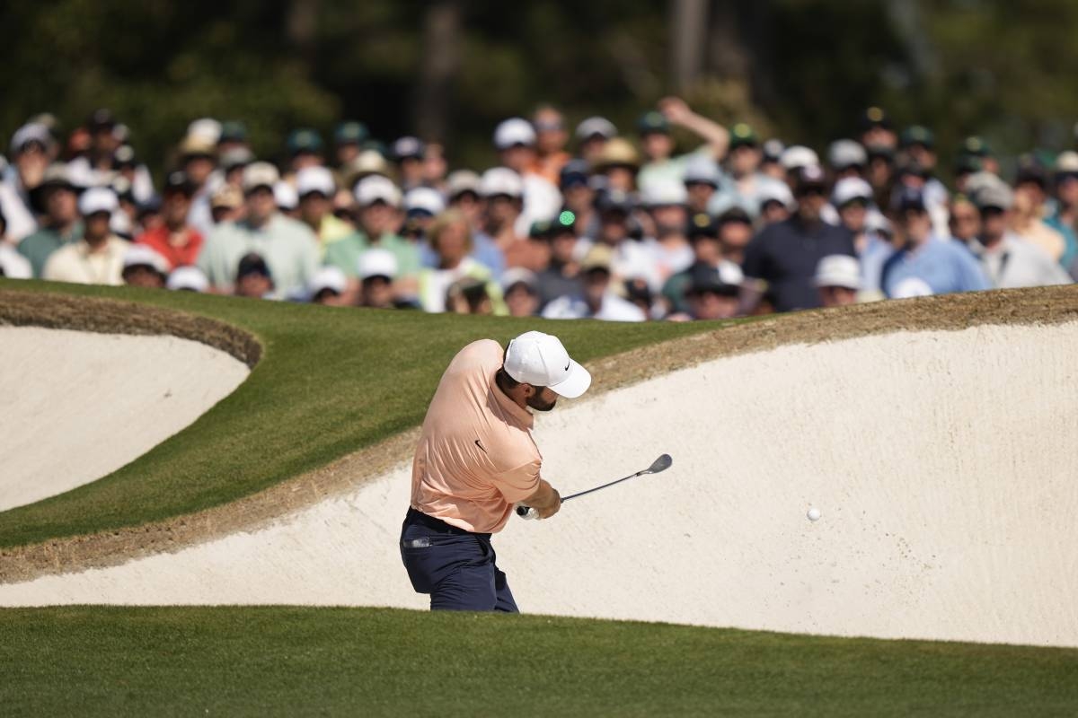 Scottie Scheffler hits from the bunker on the seventh hole during final round at the Masters golf tournament at Augusta National Golf Club Sunday, April 14, 2024, in Augusta. AP PHOTO