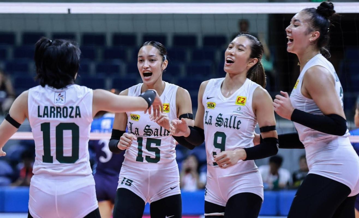 The De La Salle Lady Spikers celebrate after scoring a point against the Adamson Lady Falcons in the UAAP Season 86 women's volleyball tournament at the Smart Araneta Coliseum on Wednesday, April 17. PHOTO BY RIO DELUVIO