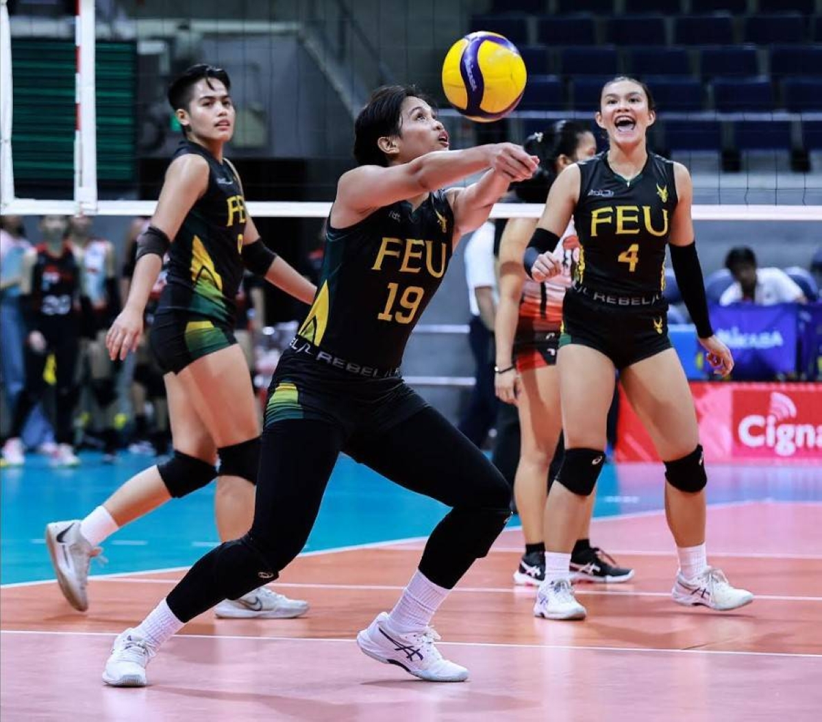 FEU’s Jean Asis (19) keeps the ball alive against UE in the UAAP Season 86 women's volleyball tournament at the Smart Araneta Coliseum on Wednesday, April 17. PHOTO BY RIO DELUVIO