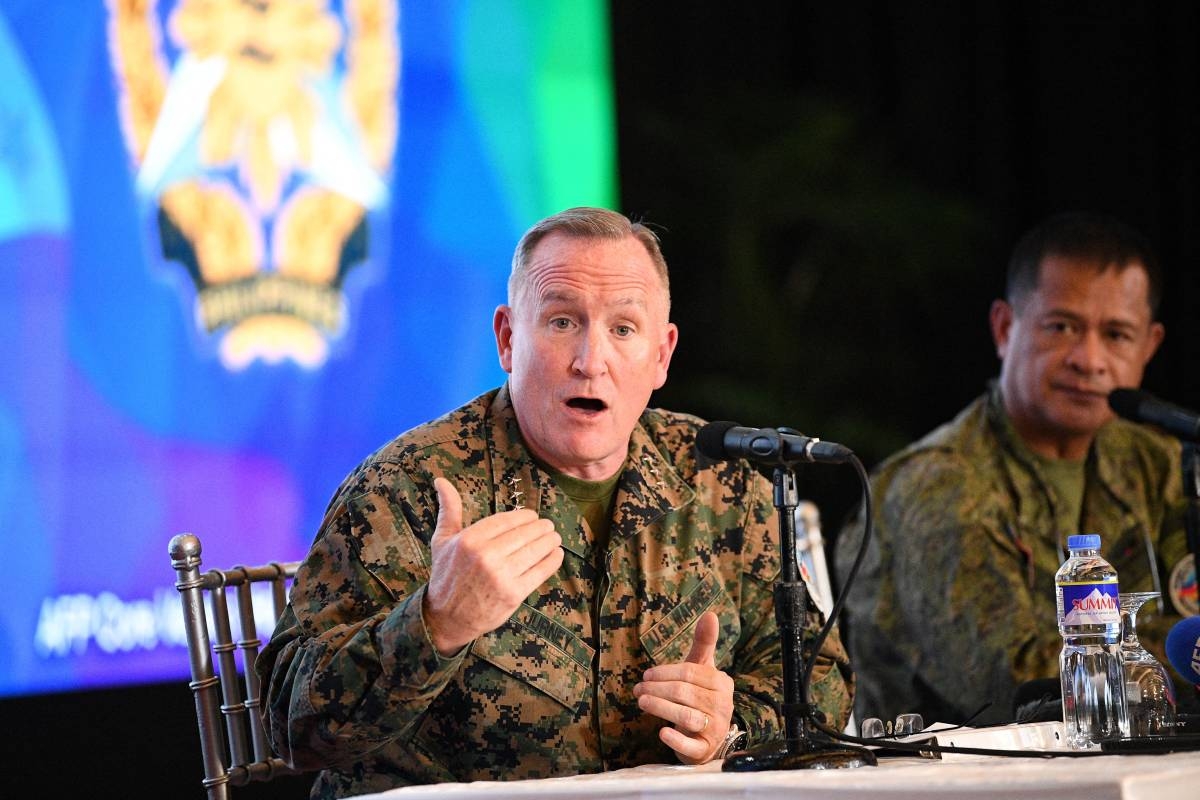 US marines Lieutenant General William Jurney (left), US exercise director, speaks while Philippine exercise director army Major General Marvin Lucudine listens during a press conference at the military headquarters in Manila on April 22, 2024, after the opening ceremony of the Philippine and US annual joint military exercise. PHOTO BY TED ALJIBE/ AFP