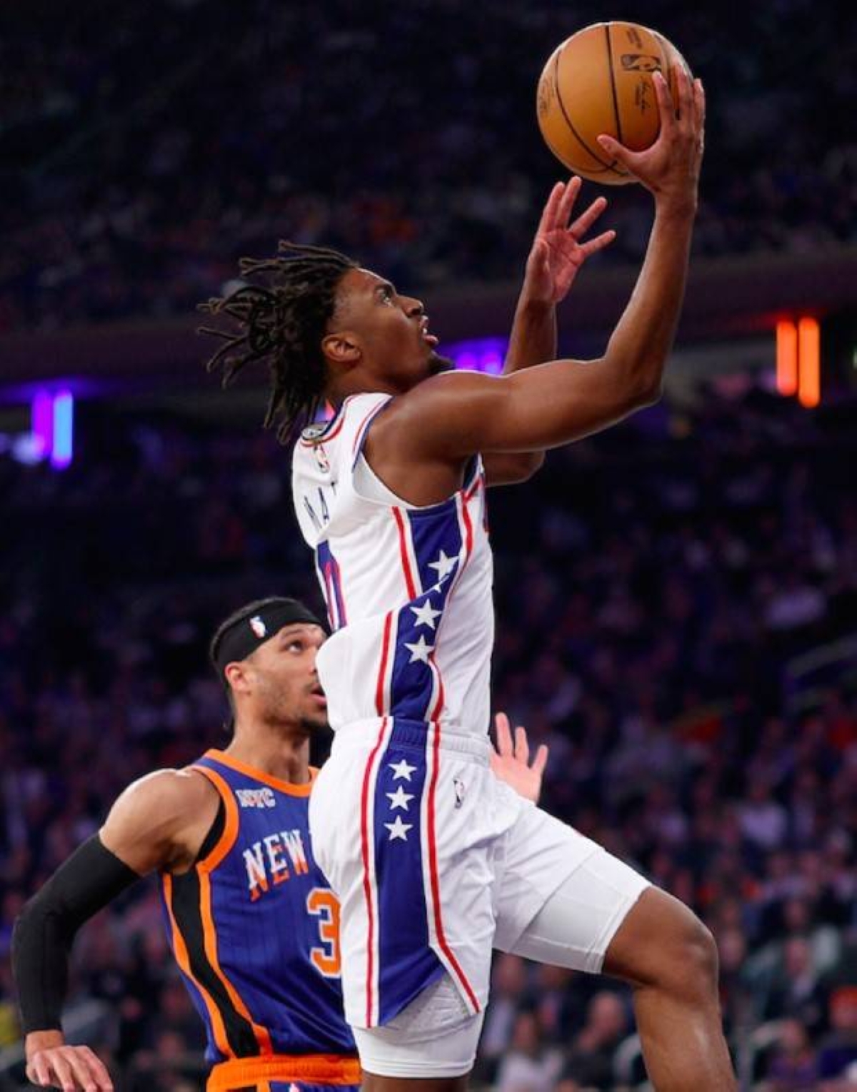 Tyrese Maxey of the Philadelphia 76ers heads for the net as Josh Hart of the New York Knicks defends during the first half at Madison Square Garden on Tuesday, April 30, 2024, in New York City. AFP PHOTO