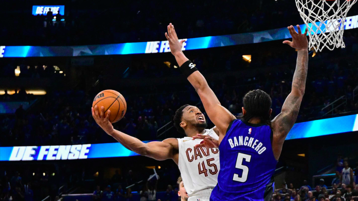 Donovan Mitchell of the Cleveland Cavaliers shoots the ball against Paolo Banchero of the Orlando Magic during the NBA Eastern Conference First Round Playoffs at Kia Center on May 3, 2024 in Orlando, Florida. AFP PHOTO