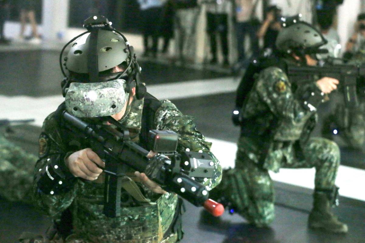 interSoldiers wearing VR headsets take part in battlefield rescue training at the National Defense Medical Center in Taipei on April 30, 2024. Photo by I-Hwa CHENG / AFP