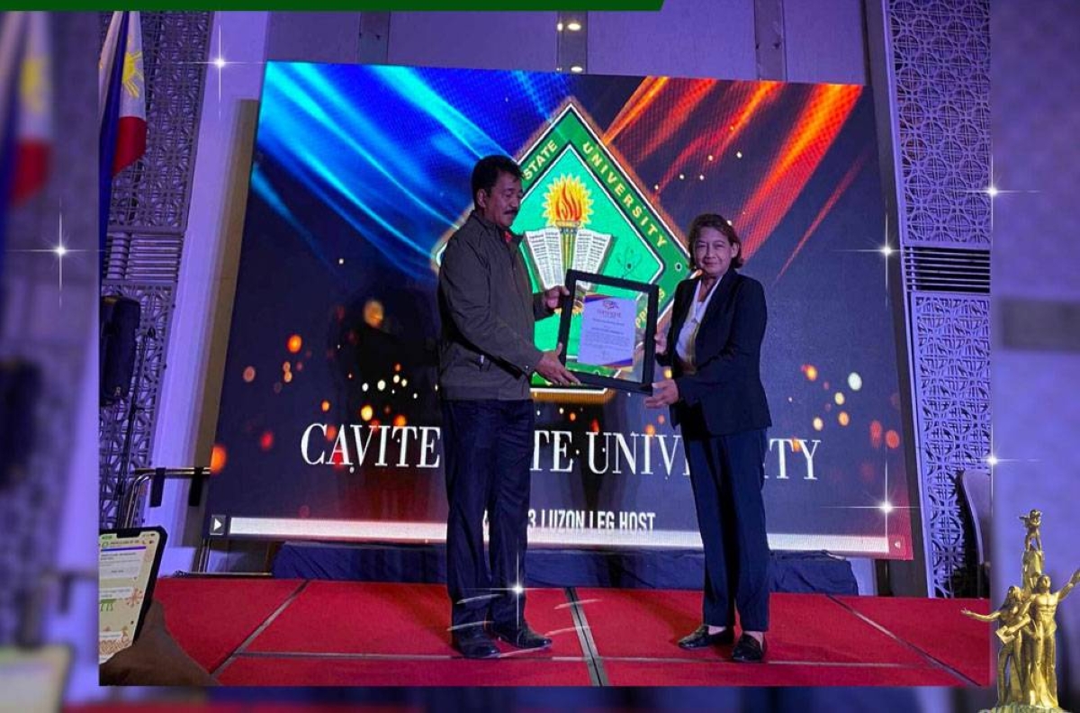 Cavite State University Director for Sports Prof. Ana Liza Mojica (right) receives the certificate of recognition awarded by Commission on Higher Education Chairman J. Prospero de Vera 3 rd (left) during the Commission on Higher Education Sports Appreciation Night at the Hive Hotel and Convention Place in Quezon City on April 27, 2024. CONTRIBUTED PHOTO