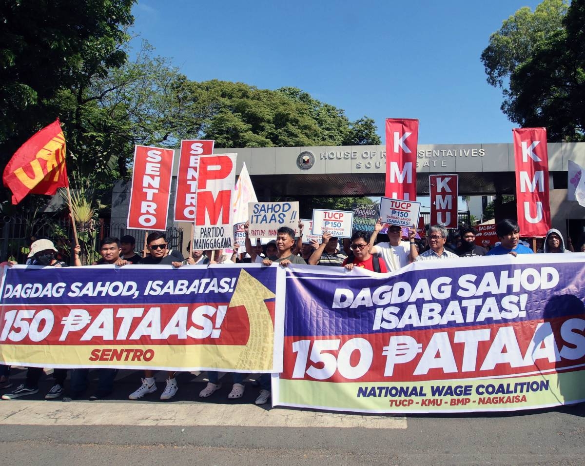 Protesting Bitmap Image WAGE HIKE DEMAND | The Manila Times