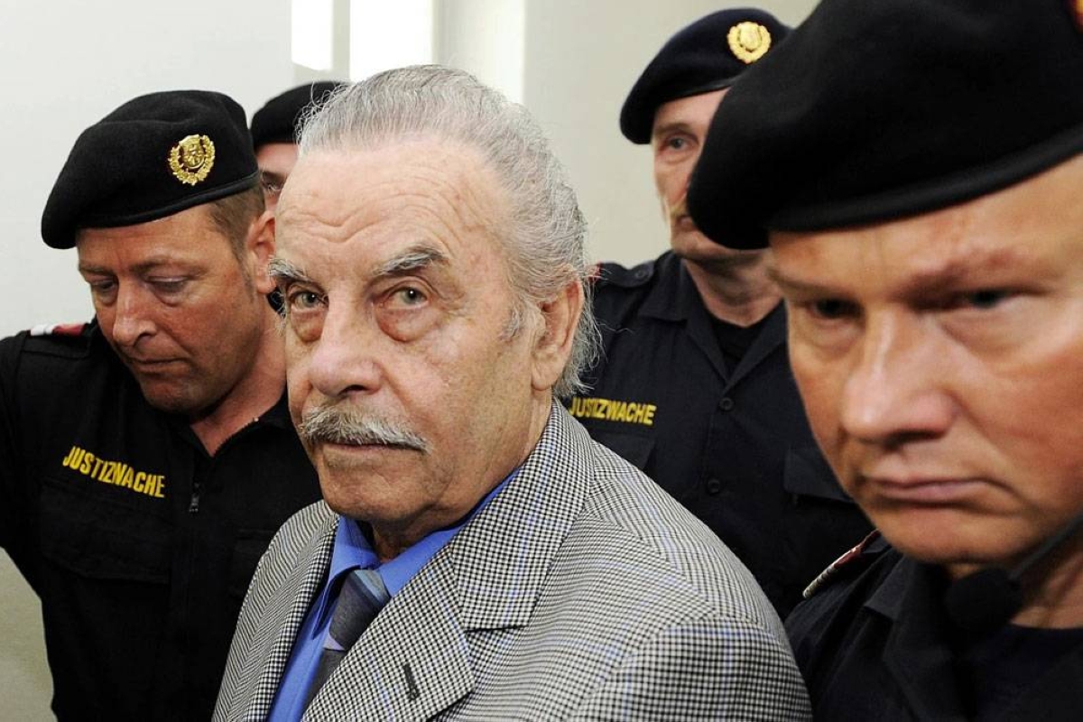GUILTY AS HELL Josef Fritzl (center) is escorted by police to a courthouse in the city of St. Poelten, Lower Austria state, northeastern Austria, on March 19, 2009. AP FILE PHOTO