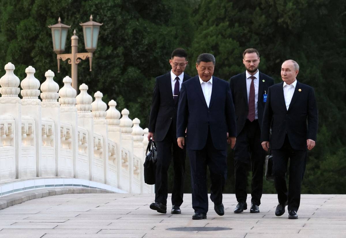 PARTNERS Russia’s President Vladimir Putin and China’s President Xi Jinping take a walk in Beijing on May 16, 2024. AFP Photo