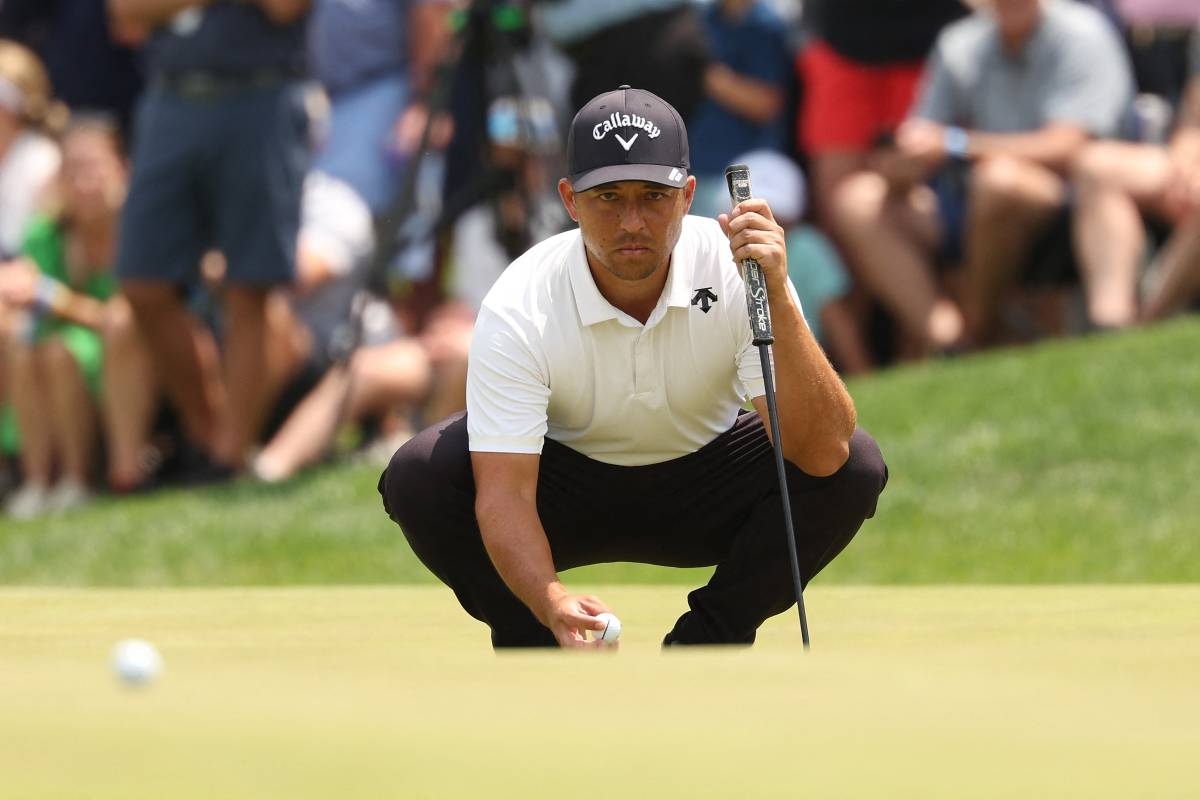 AIM LOW Xander Schauffele of the United States lines up a putt on the ninth green during the first round of the 2024 PGA Championship at Valhalla Golf Club on May 16, 2024 in Louisville, Kentucky. PHOTO BY PATRICK SMITH/AFP
