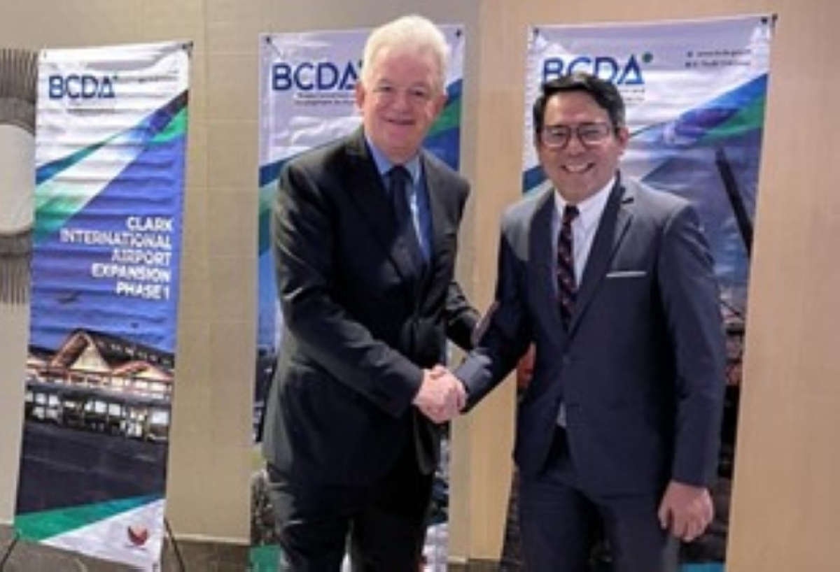 The photo shows British Chamber of Commerce of the Philippines Executive Director/Trustee Chris Nelson (left) and Bases Conversion and Development Authority head of Investment Promotions and Marketing Erwin Kenneth Peralta. CONTRIBUTED PHOTO