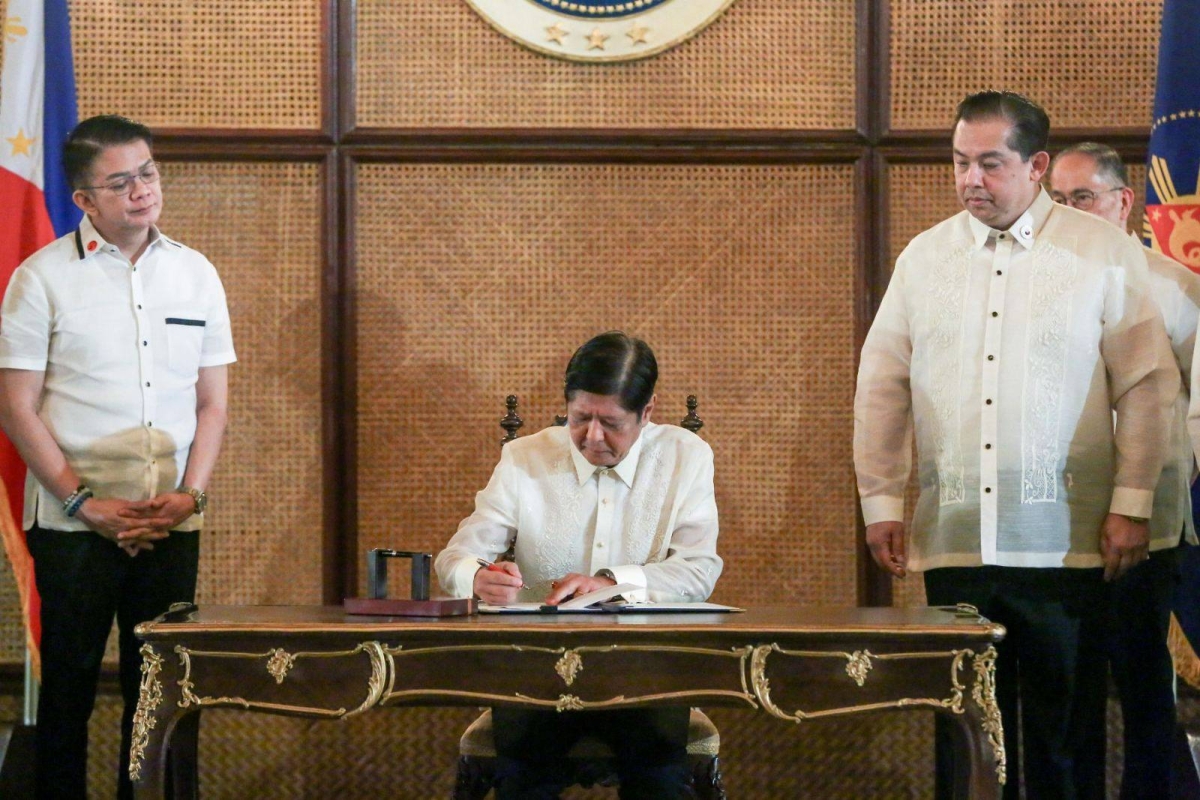 MARCOS SIGNS LAW FOR TEACHERS | The Manila Times