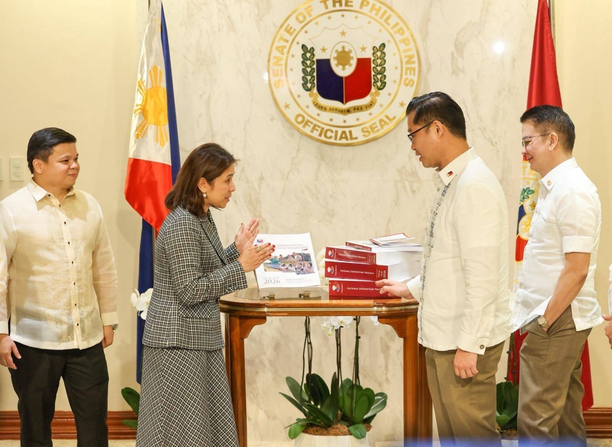 SPENDING PLAN Budget Secretary Amenah Pangandaman (2nd from left) hands the copy of the P6.793-trillion 2026 National Expenditure Program to Senate Committee on Finance Chairman Sen. Sherwin Gatchalian (3rd from left), alongside Senate President Francis Escudero (right), Sen. Joel Villanueva and Sen. Allan Peter Cayetano (not pictured), during a ceremonial turnover at the Senate of the Philippines in Pasay City on Aug.13, 2025. PHOTO BY MIKE ALQUINTO 