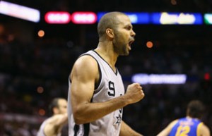 Tony Parker #9 of the San Antonio Spurs pumps his fist after making a three-point shot against the Golden State Warriors during Game Five of the Western Conference Semifinals of the 2013 NBA Playoffs at AT&T Center on May 14, 2013 in San Antonio, Texas.Ronald Martinez/Getty Images/AFP