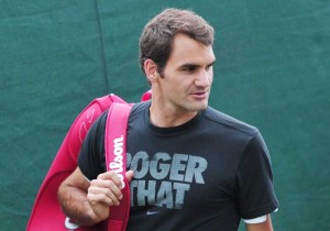 Wimbledon, Greater London:  Switzerland’s Roger Federer  leaves after a training session at the All England Tennis Club in Wimbledon, southwest London on the eve of the start of the 2013 Wimbledon Championships tennis tournament. AFP PHOTO