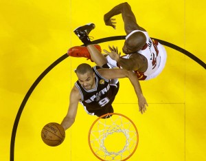 Tony Parker  No.9 of the San Antonio Spurs goes up for a shot against Joel Anthony No.50 of the Miami Heat during Game One of the 2013 NBA Finals at American Airlines Arena in Miami, Florida. AFP PHOTO