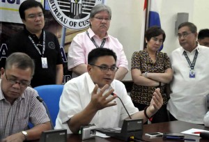 Customs Commissioner Ruffy Biazon deatails his plans for the Customs bureau in a press briefing he called after his resignation was rejected by the President.  PHOTO BY EDWIN MULI