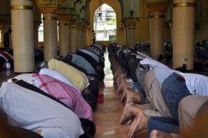 Muslims on Wednesday bow during their Dhuhr prayer at the Golden Mosque in Quiapo, Manila on the first day of Ramadan. Dhuhr is the second of five daily prayers and is done at midday. PHOTO BY EDWIN MULI 