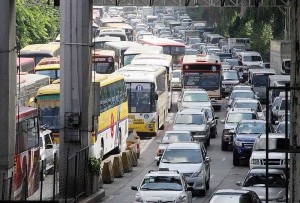 Vehicles are bumper to bumper on EDSA’s southbound lane near Boni Ave. in Mandaluyong City on Saturday as road repair crews work on reblocking sections of Metro Manila’s busiest highway. Photo by Mike de Juan 