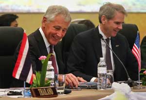 US Secretary of Defense Chuck Hagel (left) smiles prior to the Association of Southeast Asian Nations (Asean) defense minister’s meeting in Jerudong, some 20 kilometers outside Brunei’s capital Bandar Seri Begawan on Thursday. AFP PHOTO