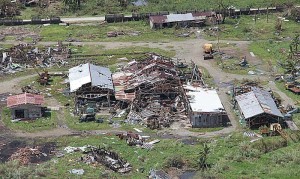 An aerial view shows the extent of damage wrought by typhoon Labuyo on a neighborhood in Aurora province. The number of dead has risen to eight while four persons remain missing. Damage to agriculture was pegged at P722 million.  Photo By Leander Domingo 