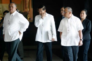 Former PNP chief Avelino Razon Jr. (center) arrives at the Sandiganbayan on Monday as the anti-graft court hears his petition for bail. Razon and several others face charges over the alleged fictitious repair of light armored vehicles worth P358.48 million. PHOTO BY MIGUEL DE GUZMAN 