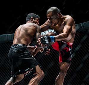 Sanshou champion Rene Catalan (right) delivers a knee strike against Brazilian jiu-jitsu world champion Alex Silva in the previous edition of One FC. PHOTO COURTESY OF ONE FC.