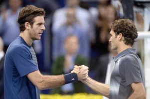 Switzerland’s Roger Federer (right) congratulates Argentina’s Juan Martin Del Potro after he won the Swiss Indoors ATP tennis tournament finals match in Basel. AFP PHOTO