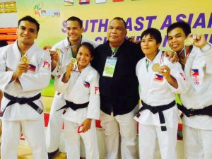 Members of the Philippine judo team display their medals at the conclusion of the 2013 Southeast Asian Judo Championships. CONTRIBUTED PHOTO.