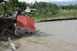 A barangay hall, also in Iloilo, collapses at the height of the typhoon’s fury.  AFP PHOTOS