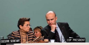 Poland’s former Environment Minister and COP President Marcin Korolec (right) and Christiana Figueres, executive secretary of the United Nations Framework Convention on Climate Change, attend the 19th conference of the United Nations Framework Convention on Climate Change COP19 in Warsaw on Saturday (Sunday in Manila). AFP PHOTO