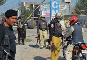 A Pakistani policeman checks a commuter at a security check point in Peshawar on Saturday following the killing of Taliban leader Hakimullah Mehsud in a United States drone attack in the Pakistan tribal region. AFP PHOTO