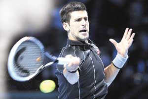 Djokovic reaches semis, Federer stays alive