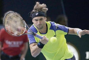 Spain’s David Ferrer returns a shot to compatriot Rafael Nadal during their semi final match at the ninth and final ATP World Tour Masters 1000 indoor tennis tournament at the Bercy Palais-Omnisport in Paris. AFP PHOTO