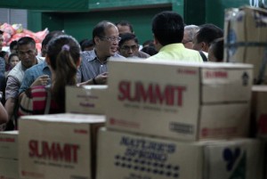 President Benigno Aquino 3rd takes charge of the vast government relief operations in areas ravaged by Super Typhoon ‘Yolanda’ last week. The President visited relief repacking centers in Metro Manila on Friday and was scheduled to fly back to Leyte on Saturday.  MALACAÑANG PHOTO