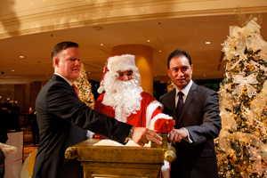  Makati Shangri-La’s Andrew Den Oudsten and Manila Water’s Ferdinand Dela Cruz officially welcome the Christmas season as they switch on the lights of Christmas Trees at the hotel lobby together with Santa Claus