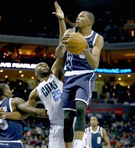 Kevin Durant No.35 of the Oklahoma City Thunder drives to the basket against Al Jefferson No.25 of the Charlotte Bobcats during their game at Time Warner Cable Arena in Charlotte, North Carolina. AFP PHOTO