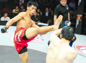 Honorio “The Rock” Banario (in red trunks) in action. PHOTO COURTESY OF ONE FC