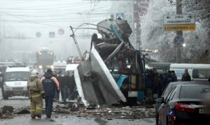 Russian firefighters and security personnel inspect the destroyed trolleybus in Volgograd on Monday. Ten people were killed in a bombing that destroyed a packed trolleybus in the southern Russian city of Volgograd, the second attack in the city in two days after a suicide strike on its main train station, officials said. AFP PHOTO