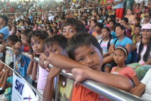 The Tacloban residents gather at the astrodome to catch a screening of ABS-CBN concert for free in time for Christmas season