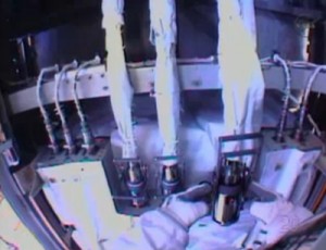 A still image taken from the National Aeronautics and Space Administration television on Saturday shows astronaut Rick Mastracchio fixing a broken equipment cooling system on the International Space Station. Mastracchio and colleague Mike Hopkins are on the first of three urgent spacewalks called for due to a faulty valve that caused a partial shutdown in the system that regulates equipment temperature at the space station. AFP PHOTO