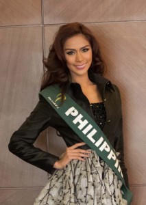 Angelee delos Reyes poses for photographers as she prepares for the Miss Earth pageant. Delos Reyes will represent the Philippines in the beauty contest. PHOTO BY ALEXIS CORPUZ 