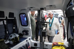 Defense Secretary Voltaire Gazmin inspects one of three newly-acquired AW-109 helicopters of the Armed Forces of the Phils. The helicopters were blessed during the celebration of the AFP’s Thanksgiving Day at the GHQ canopy area. PHOTO BY MIKE DE JUAN 