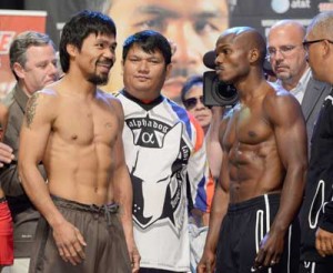 Manny Pacquiao (left) and Timothy Bradley during the weigh-in of their previous fight. AFP FILE PHOTO