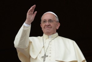 Pope Francis delivers his traditional Christmas “Urbi et Orbi” blessing from the balcony of Saint Peter’s Basilica on Wednesday at the Vatican.  AFP PHOTO 