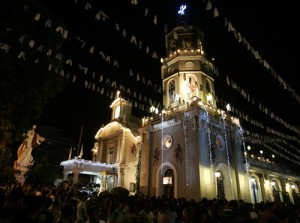 Catholics attend the first dawn Mass at the Concepcion Church in Malabon City. PHOTO BY RENE DILAN