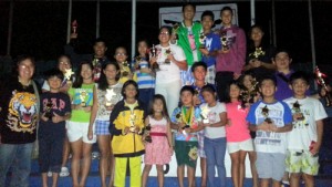 Philippine Swimming League (PSL) President Susan Papa, and coaches Virgie de Luna of Quezon Killer Whales and Ryan Robles of MCU-R3 swimming team join the most outstanding swimmers of The Manila Times College Swimming Championship