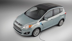 Ford’s C-Max Solar Energi’s roof panels to charge batteries, supplementing power coming from gasoline engine.